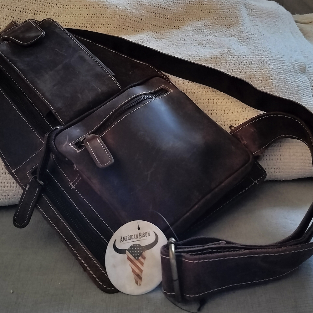 Brown Messenger Bag with Adjustable Strap and Sleek Design